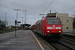 146 114-4 mit einem RE von Offenburg nach Basel SBB am Nachmittag des 28.02.14 kurz nach dem Halt in Mllheim (Baden).