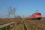 111 054 mit einer RB von Neuenburg (Baden) nach Freiburg (Breisgau) Hbf am Nachmittag des 08.03.14 südlich von Hügelheim.