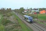 X73903 als IRE von Freiburg (Breisgau) Hbf über Müllheim (Baden), Neuenburg am Rhein und Bantzenheim nach Mulhouse-Ville, am Nachmittag des 02.04.14 südlich von Buggingen.