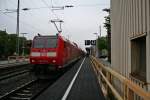 146 113-6 mit einem RE von Schliengen nach Offenburg am Morgen des 18.04.14 kurz vor dem Halt in Mllheim (Baden).
