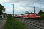 146 110-2 mit einem RE von Schliengen nach Freiburg (Breisgau) Hbf am Abend des 28.05.14 beim Verlassen des Bahnhofs Mllheim (Baden).