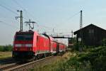 146 232-4 mit einem RE von Schliengen nach Freiburg (Breisgau) Hbf am Morgen des 01.08.14 bei der Einfahrt in Auggen.