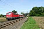 111 062-6 mit der RB 26567 auf der Fahrt von Offenburg nach Neuenburg (Baden) am Mittag des 08.08.14 sdlich von Kollmarsreute.