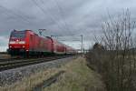 146 113-6 mit einem RE von Offenburg nach Basel Bad. Bf am Nachmittag des 03.01.14 bei Hgelheim.