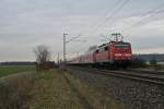 111 048-5 mit der RB 26566 von Neuenburg (Baden) ber Freiburg (Breisgau) Hbf nach Offenburg am Nachmittag des 29.01.14 bei Hgelheim.