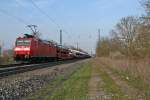 185 133-6 mit einem gemischten Gterzug gen Sden am Nachmittag des 27.03.14 im Bahnhof Heitersheim.