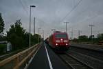 185 174-0 mit einem KLV-Zug aus der Schweiz auf dem Weg in Richtung Norden am Morgen des 18.04.14 im Bahnhof Mllheim (Baden).