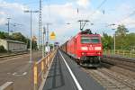 185 092-4 mit einem gemischten Gterzug auf dem Weg nach Basel am Nachmittag des 25.04.14 in Mllheim (Baden).