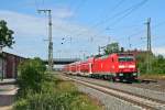 143 233-2 mit einem RE von Offenburg nach Schliengen am Nachmittag des 14.06.14 in Mllheim (Baden).