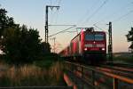 143 640-1 mit einem RE von Offenburg nach Schliengen am Abend des 16.07.14 bei der Einfahrt in Mllheim (Baden).