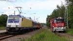 146 542-6 und 185 406-6 mit ihrem Messzug und das HLF 24/16-S der Ffw St.Georgen in St.Georgen 14.6.12. Das HLF war zum Befllen der Wassertanks im Reisezugwagen vor Ort.