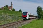 Nachschuss auf den von 204 010-6 gezogenen RABe 524 301, die am 16.08.2019 von Konstanz kommend auf der Fahrt Richtung Friedrichshafen unterhalb der Wallfahrtskirche Birnau fotografiert wurden.