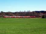 218 461-2 schiebt RB 32954 von Hergatz nach Wangen (Allgu) kurz nach der Abfahrt in Hergatz am 06.04.2010.