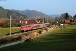 Kurz bevor das Licht aus war, kam die 111 167-3 mit dem RE 19918 Nürnberg-Stuttgart bei Schleißweiler vor die Linse gefahren. Aufgenommen am 08.03.2014.