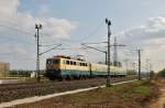 140 423 und zwei Bm-Wagen am 11.04.2014 nördlich von Ebensfeld auf dem Weg nach Lichtenfels.