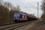 185 409 Raildox durchfährt am 06.12.2013 mit einem Getreidezug den Bahnhof Michelau in Richtung Kronach.