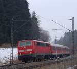 111 023-8 zieht den RE 30017  Mnchen-Salzburg-Express  kurz nach dem Halt in Grokarolinenfeld gen Rosenheim.