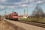 Die 1116 032 mit Gterwaggons bei bersee am 13.04.2013