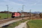 Die 1116 143 mit Gterzug bei Teisendorf am 08.11.2013