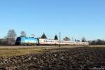 Seit dem Fahrplanwechsel 2013 wird der IC 2082  Königssee  von Berchtesgarden nach Hamburg wieder mit einem ÖBB Taurus bespannt.
Am 14.12.13 bespannte der ÖBB Kyoto Werbetaurus den Zug von Berchtesgarden bis Hamburg und ist hier bei Übersee zu sehen.