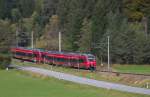 2442 204 und ein weiterer Werdenfels Hamster sind als RB München Hbf. - Mittenwald unterwegs und haben gerade den Bahnhof Klais verlassen und schicken nun sich an die Schmalenseehöhe zu erklimmen. Bahnstrecke 5504 Müchen - Mittenwald Grenze am 07.10.2014