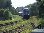 223 068 passiert am 22.8.2008 mit seinem Alx am Hacken den Bahnbergang bei Bhl am Alpsee (km 85,977).