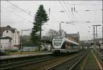 ET 2203  Essen  beschleunigt als ABR 99619 ,von Siegen nach Essen Hbf, aus dem Bahnhof Plettenberg Richtung Norden.