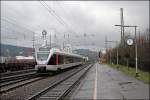 ET23001 fhrt als ABR99618, (RE16  Ruhr-Sieg-Express  nach Siegen, in Plettenberg ein. (03.04.2008)