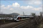ET23003 und ein ET22 sind als ABR99675 (RE16  Ruhr-Sieg-Express ), Siegen/Iserlohn - Essen Hbf, beim Harkortsee unterwegs. (07.03.2009)
