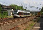 ET 22 003(2-teiliger Stadler Flirt) der Abellio Rail NRW fhrt am 04.06.2011 kurz vor dem Bf Kreuztal. Er fhrt die Strecke Siegen-Hagen (RB 91 Ruhr-Sieg-Bahn). 