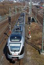 ET 23 001(3-teiliger Stadler Flirt) der Abellio Rail NRW kommt am 24.03.2012 von der Ruhr an die Sieg, hier kurz vor der Entstation Hbf Siegen. Er fährt die Strecke Essen-Hagen-Siegen (RE 16 Ruhr-Sieg-Express). 