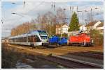 ET 23003 (3-teiliger Stadler Flirt) der Abellio Rail NRW fährt am 30.12.2013 von Kreuztal weiter in Richtung Siegen.
