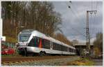ET 23006  Plettenberg   (ein 3-teiliger Stadler Flirt) der Abellio Rail NRW hat gerade (am15.03.2014) im Bahnhof Siegen-Weidenau verlassen, und fährt als RE 16   Ruhr-Sieg-Express  die Verbindung