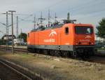 143 001-6 von Arcelor-Mittal beim Rangieren im Bahnhof Warnemnde Sie fuhr gegen 19.03 Uhr von Warnemnde Richtung Cottbus.(07.08.10)