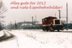 Alles Gute fr 2012! Zum Bild: D1 der Bentheimer Eisenbahn AG mit Sperrfahrt 308 zwischen Ochtrup-Brechte und Bad Bentheim in Bad Bentheim am 28-12-2000.