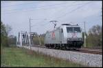 185 539-4 TXLOGISTIK  TRAXX 185 fhrt auf der KBS 104(Hamburg-Travemnde) in Richtung Skandinavienkai um einen Gterzug abzuholen.8.05.2013 12:04:41Uhr