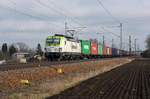 193 894 der Captrain schleppte am 28.02.21 einen Containerzug durch Gräfenhainichen Richtung Bitterfeld.