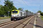 248 032 der Captrain führte am 05.07.23 den Smartrail-KV durch Wittenberg-Altstadt Richtung Dessau.