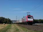 185 594 von crossrail fhrt mit seinem Gterzug durch Ladenburg. Aufgenommen am 5.8.2009