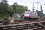 Die 185 594-9 von Crossrail kommt als Lokzug von Herzogenrath und fhrt in Aachen-West ein bei Sonne und Wolken.