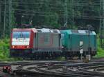 185 597-2 und 145-CL 005 von Crossrail stehen am 31.05.2012 in Aachen West.