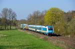 Der ALX 84115 von Hof nach München HBF hatte am 11. April 2016 den TEE-farbenen Speisewagen im Zugverband, Zuglok war 183 003. Im Korbianiholz, welches der Zug gerade durchfährt, kehrt schon langsam der Frühling ein.