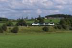 Ein Desiro der Vogtlandbahn ist bei Gutenfrst in Richtung Plauen unterwegs. Im Hintergrund der Kandelhof. Die Desiros sind eher selten auf dieser Strecke anzutreffen. 04.08.2012