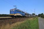 140 774-1 der EVB mit voll beladenem Autotransportzug in Fahrtrichtung Nienburg(Weser). Aufgenommen bei Eystrup am 22.07.2015.