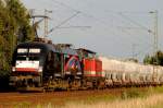 ES 64U2-002 und 212 024-4 EGP mit Zement-Zug am Abend des 05.08.2011 bei Woltorf