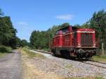 D25 (ex-DB 211 345-4) der Bentheimer Eisenbahn AG whrend eine Lokfahrt fr die Emslndische Eisenbahn GmbH zwischen Haselne und Meppen bei Bokeloh am 16-7-2010.