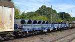 Drehgestell-Flachwagen mit Seitenborden vom Einsteller ERR mit der Nr. 37 TEN 80 D-ERR 3988 036-4 Rens (GE) beladen mit Drahtrollen in einem gemischten Güterzug am 31.08.22 Durchfahrt Bahnhof Niederndodeleben.