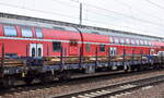 Drehgestell-Flachwagen vom Einsteller ERR GmbH mit der Nr. 37 TEN 80 D-ERR 3505 312-3 Rns (GE) Bf. Duisburg-Hafen beladen mit Schienenteilen in einem Ganzzug am 23.03.23 Durchfahrt Bahnhof Flughafen BER Terminal 5 