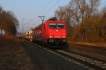 185 582-4 der HGK mit einem Ganzzug von Tankcontainern in Fahrtrichtung Süden. Aufgenommen in Wehretal-Reichensachsen am 16.02.2015.