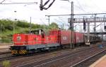Güterzugdurchfahrt in Kassel-Wilhelmshöhe, angeführt von der DG 202 der Hessischen Landesbahn(21.06.2014).